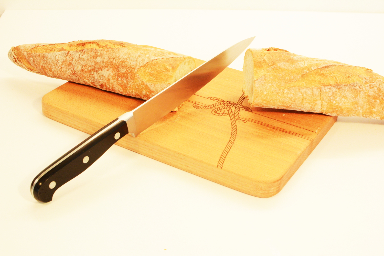 Cutting Board in use, cutting bread