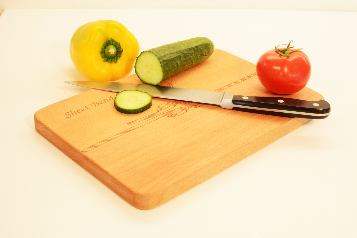 Cutting Board in use, cutting vegetables